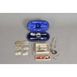 A cased three piece silver Christening set