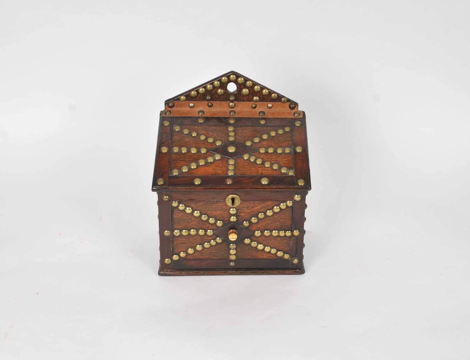 A 19th century studded oak candle box