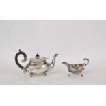 A presentation silver teapot