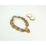 A 9ct gold bracelet and two diamond set rings