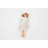 A French Societe de Fabrication de Bebes et Jouets porcelain headed doll with composition jointed