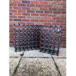 Two similar galvanised and stained pine wine racks