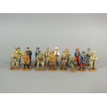 A collection of approximately fifty hand-painted cast metal Del Prado figures representing various