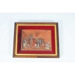 A rectangular terracotta panel, 20th century moulded on relief with a village scene, featuring a