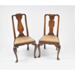 An associated pair of 18th century Queen Anne style dining chairs 101cm high, 50cm wide, 45cm seat