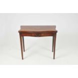 A small mid 18th century mahogany card table, the hinged serpentine top over a single narrow drawer,
