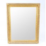 A large gilt gesso wall mirror, 116 x 147cm high