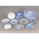 A mixed collection of blue and white plates