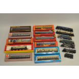 A collection of 00 gauge model railway effects, mostly coaches and cars to include fourteen boxed