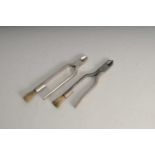 Two similar antique silver-plated pairs of champagne wire pliers, each fitted with brushes to grips,