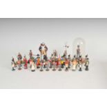 A miscellaneous collection of mixed hand-painted cast metal soldiers, approximately 40 in total,