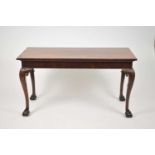 A 19th century, George II style, mahogany rectangular serving table, on acanthus carved cabriole