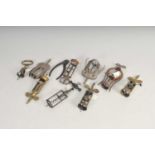 An interesting collection of nine various 19th century and later corkscrews to include brass