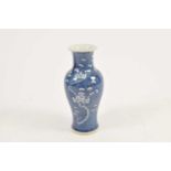 A large Chinese blue and white porcelain vase, decorated with prunus blossom, of baluster form, with