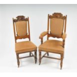 A set of seven late 19th / early 20th century carved oak dining chairs (six witrh a single carver)