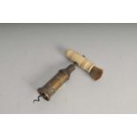 A 19th century Thomason type brass barrel corkscrew, with a turned bone brush handle, with