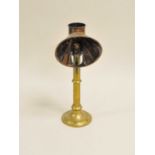 A brass student's lamp, Miller's of London, with a single burner 39 cm high.