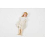 A French Societe de Fabrication de Bebes et Jouets porcelain headed doll with composition jointed