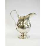 A George III pedestal silver cream jug