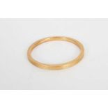 A 9ct gold bangle