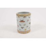 A late 19th /early 20th century Chinese cylindrical vase, painted with butterflies, marked to the