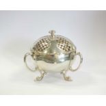 An Edwardian silver potpourri bowl and cover