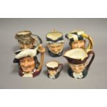 A collection of Royal Doulton character jugs