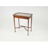 An unusual Edwardian mahogany serving / butler's trey table, the top accommodating a lifting glass