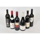 Six assorted bottles of red wine