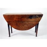 A George III oak gate leg dining table