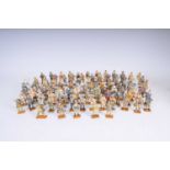 A collection of approximately ninety-eight hand-painted cast metal Del Prado figures representing