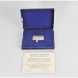 A Danbury Mint commemorative silver Concorde ingot