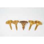 A set of four matching 20th century Italian carved and gilt wood wall brackets, of tapering fluted