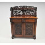 A 19th century mahogany chiffonier of diminutive proportions, with an intricately carved rail and
