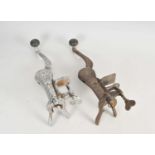 Two early 'Original Safety' cast iron pub bar-mounted bottle opener corkscrews, with articulated
