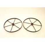 A pair of iron cart wheels, 70cm diameter,.