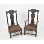 A set of ten Victorian oak dining chairs, together with two further chairs, with carved backs and