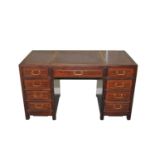 A 20th century mahogany desk, 137cm wide x 66cm deep
