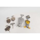 A selection of corkscrews to include a novelty Italian Brevettato 'Barman Opener', a similar clown