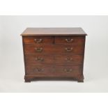 A George III mahogany rectangular chest of drawers, with two short and three long graduated,