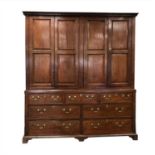 A large 19th century country oak house keeper's cupboard