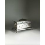 A large silver scoll/jewellery casket