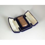 A cased Victorian 9ct gold presentation needle case