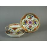 Worcester 'Dragons in Compartments' teacup and two saucers
