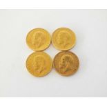 Four George V sovereigns