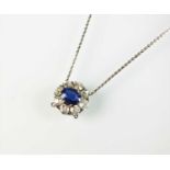 A sapphire and diamond pendant