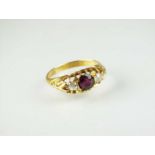 An 18ct gold untested ruby and diamond ring