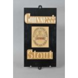 An original 20th century slate backed pub sign advertising Guinness Stout