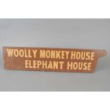 A 20th century hand painted zoo sign 'Woolly Monkey House, Elephant House'
