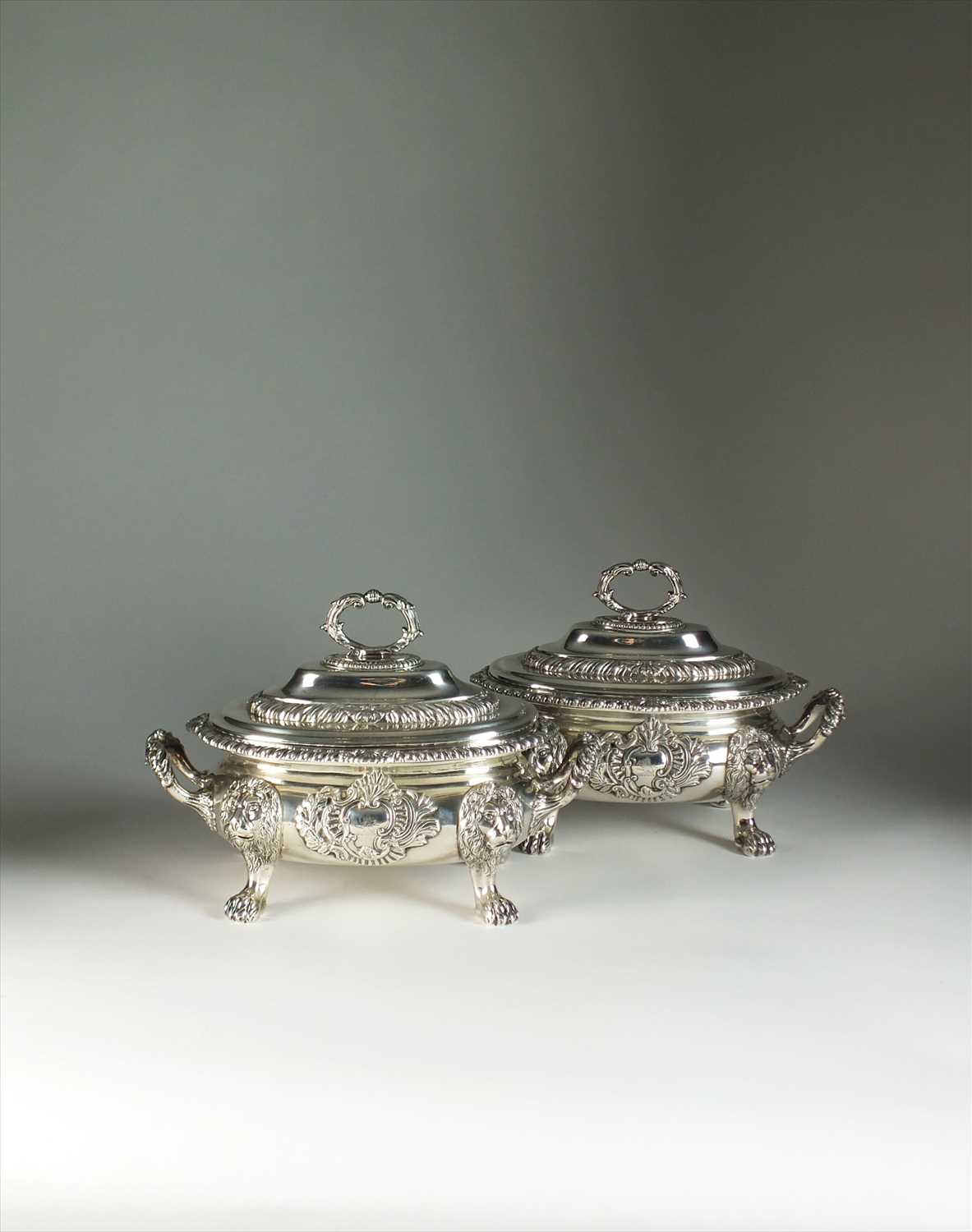 A pair of George III silver sauce tureens